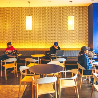 Student studying at Sip dining venue 