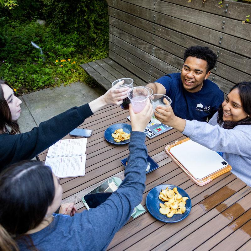 students sitting at outdoor patio at Lobo