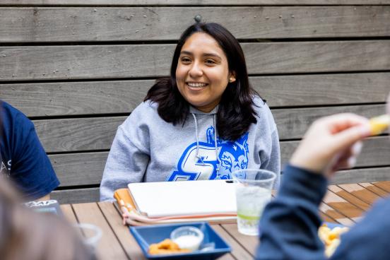 student wearing ssu shirt