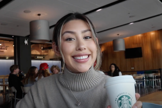 student having coffee