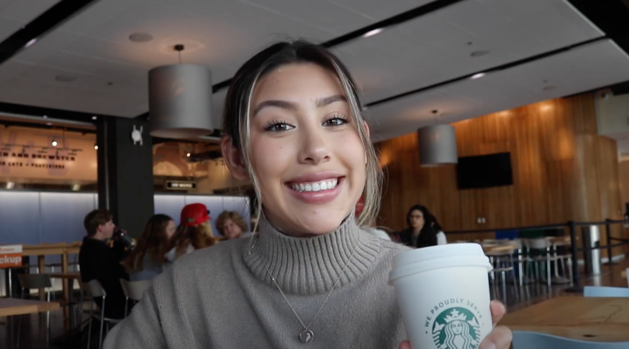 student having coffee