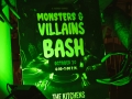 monsters and villains bash sign lit by green light