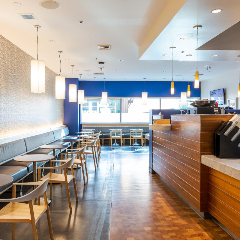 Sip venue with tables and chairs and counter
