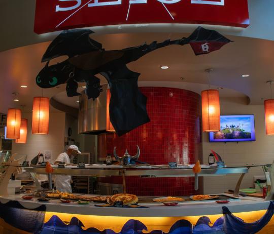 dragon cutout hanging over venue