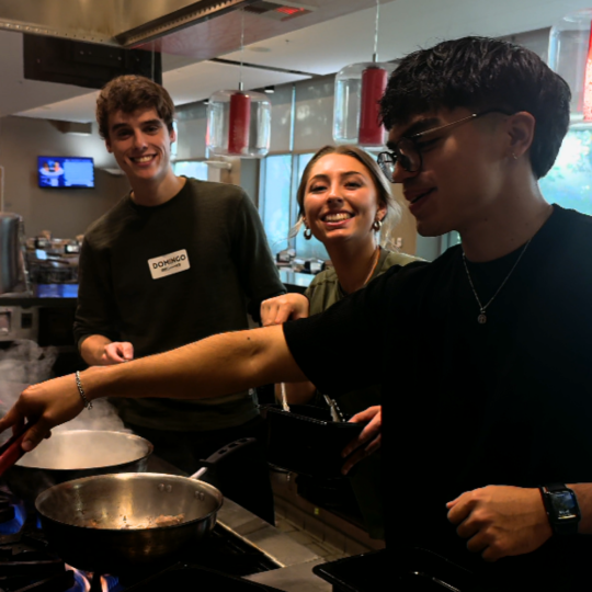 Students cooking during a class