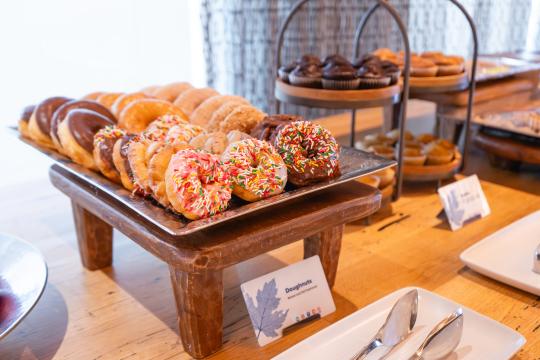 Doughnuts and pastries on display 