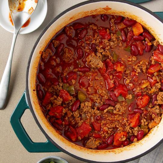 Chili in a bowl with meat, beans and pepper