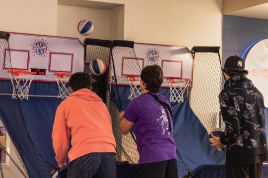 Students playing basketball