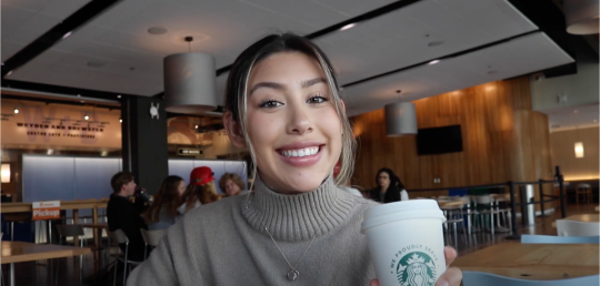 student having coffee