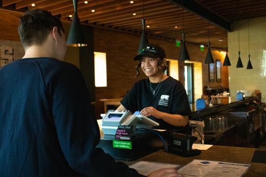 cashier helping customer